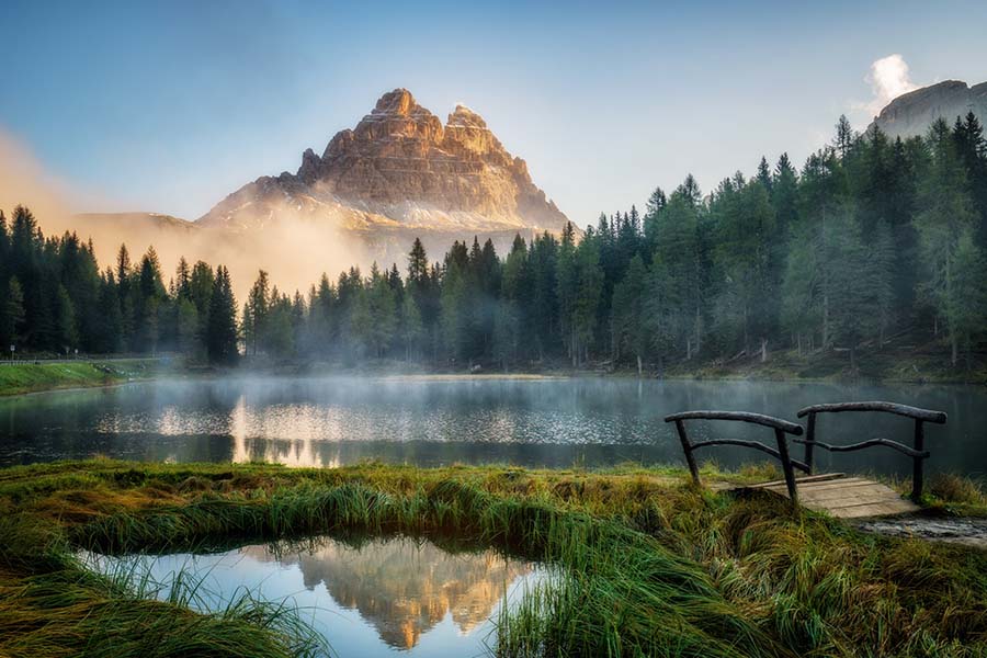 lake with mist mountains