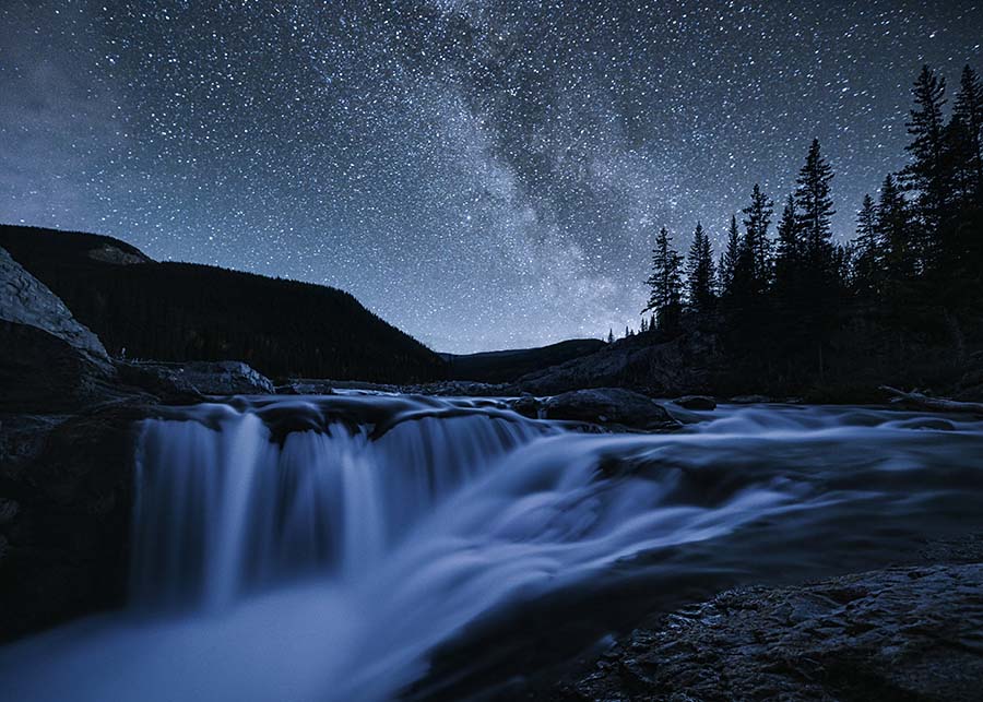 waterfall milkyway at night long exposure
